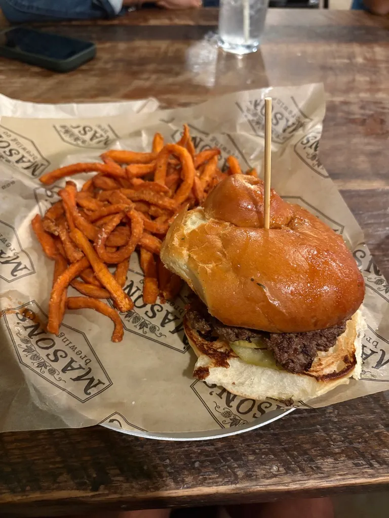 The burger at Mason's Brewing Company. Apple slices in it, and somehow it worked.